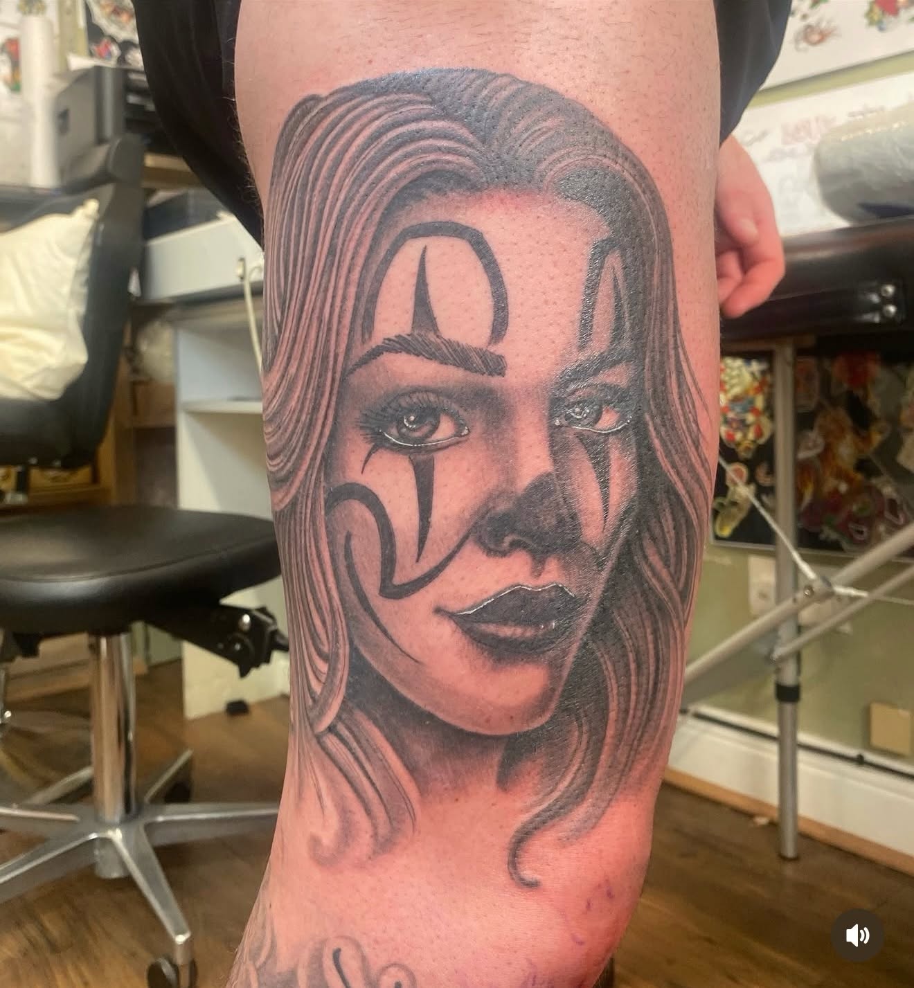 Chicano style black and grey portrait tattoo